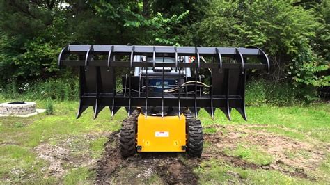 skid steer ripper attachment|bobcat rock picker attachment.